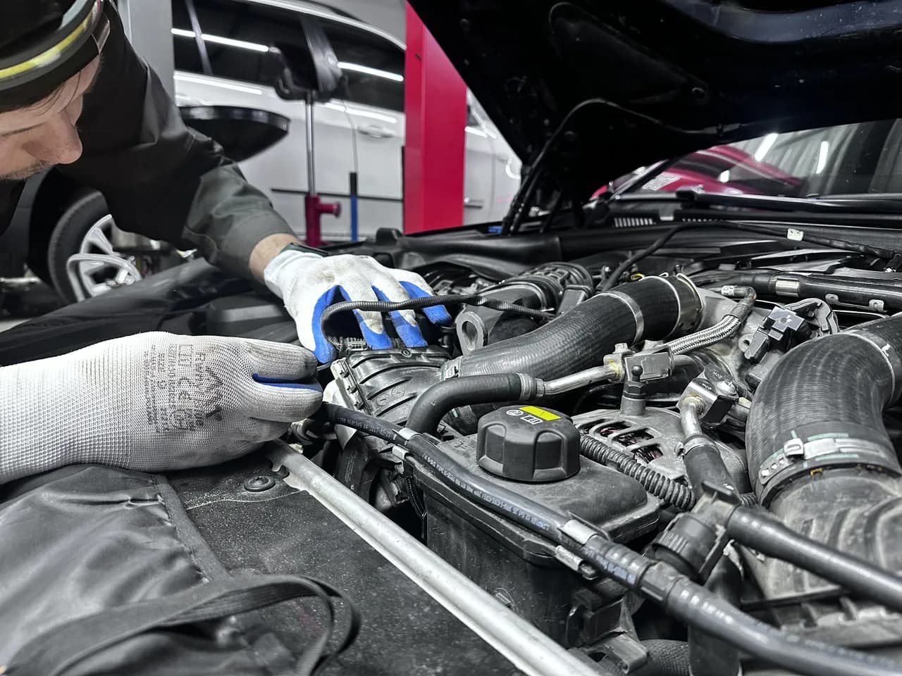 mechanic at work at eMechaniq car service, Kyiv