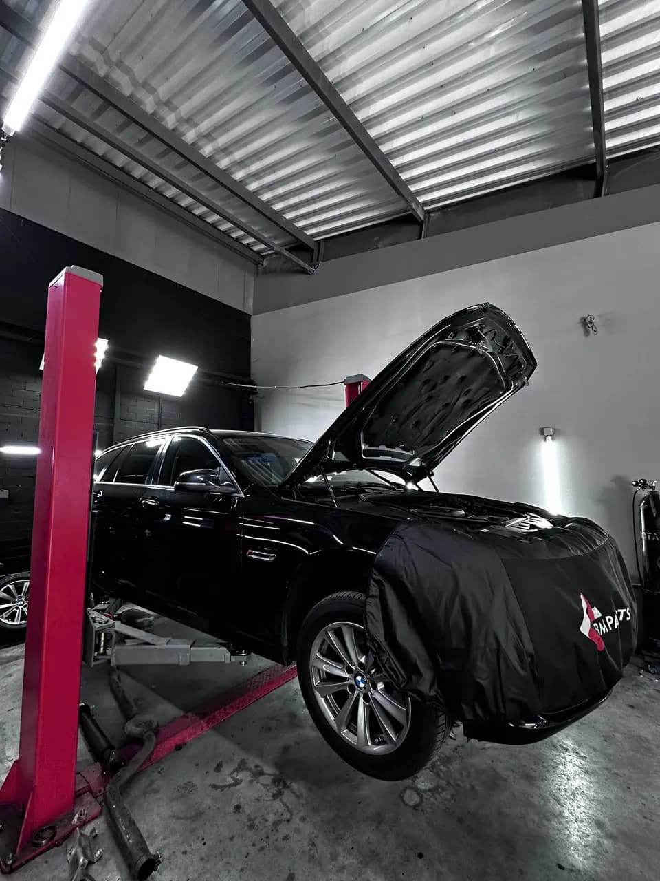 BMW X5/X6 F15/F16 on the lift at eMechaniq car service, Kyiv