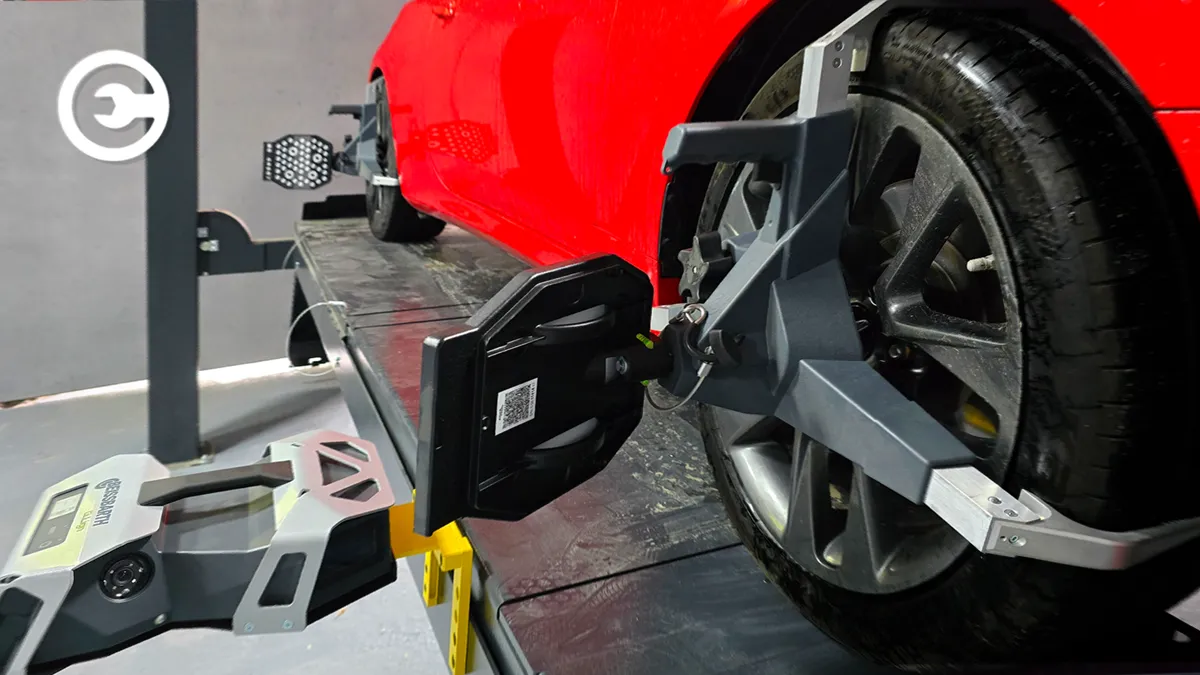 Alignment stand with wheel sensors at yeMekhaniq auto service